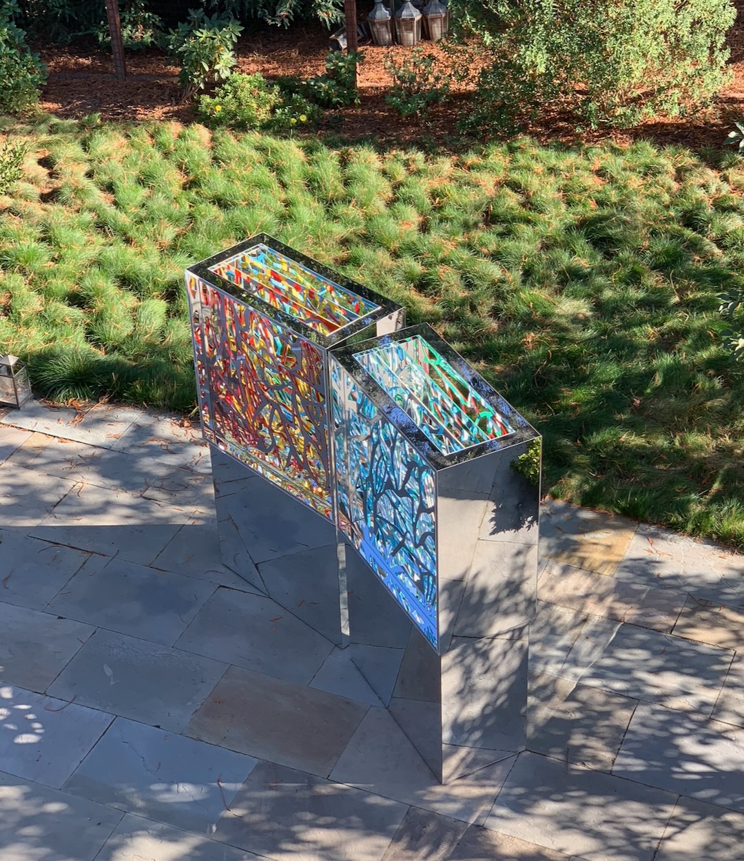 The two panels of an Ambrosia seen from above on a stone terrace