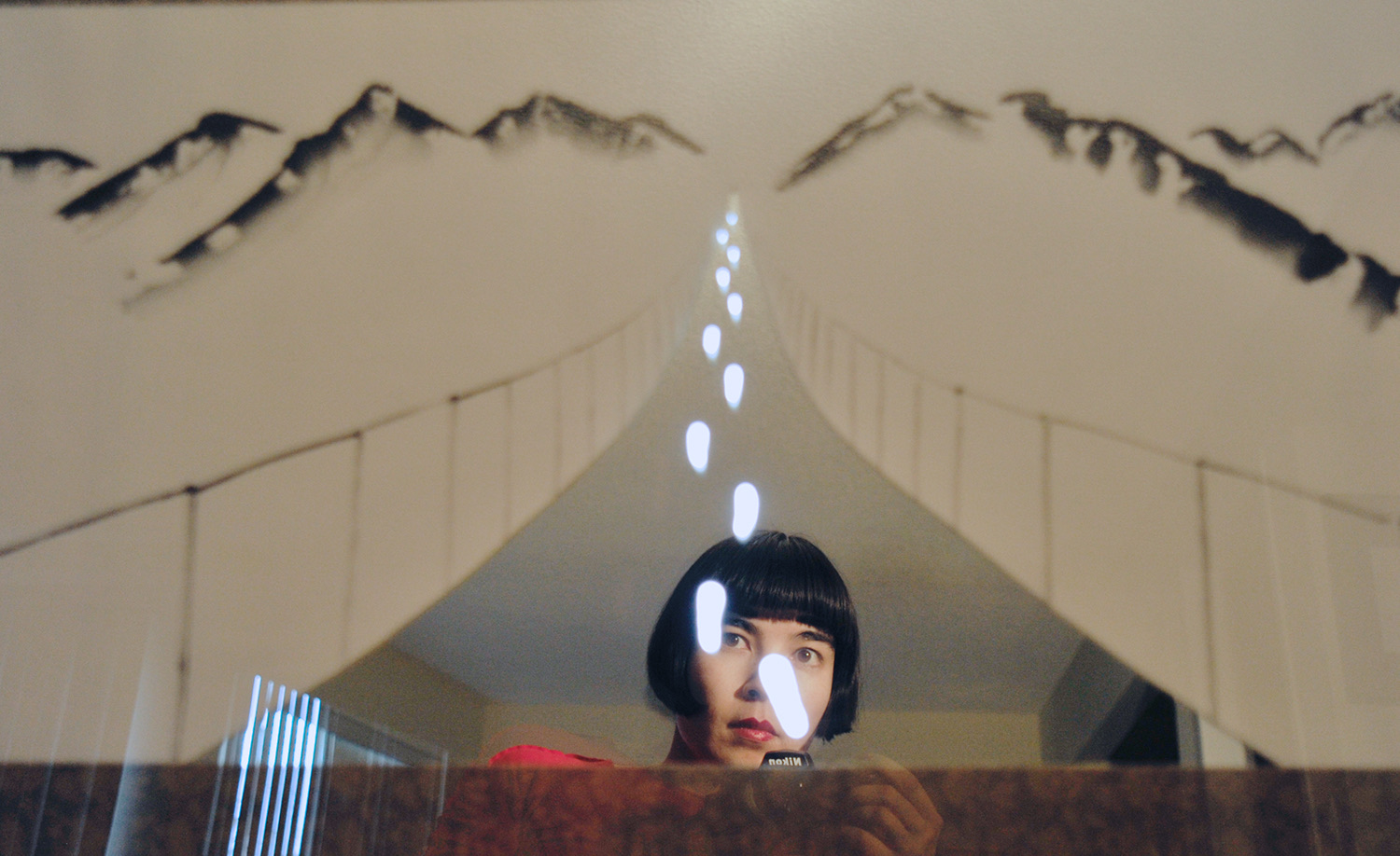 Each viewer sees herself or himself in the art, cast into the bridge